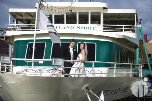 Portland Spirit | Columbia Deck Bow | A couple in wedding attire A couple in wedding attire on the bow of the Portland Spirit
